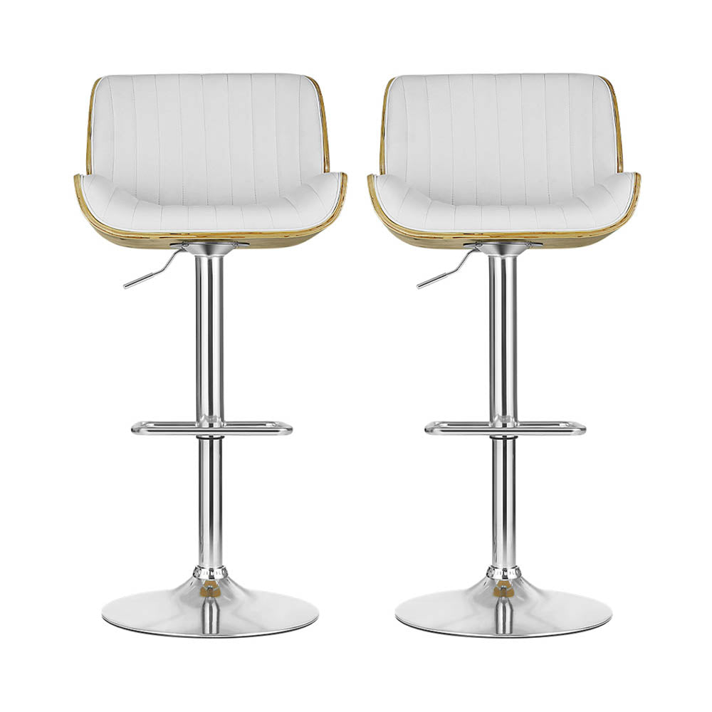 Mills Beach white gas lift bar stool with curved bentwood seat at a kitchen island