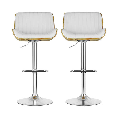 Mills Beach white gas lift bar stool with curved bentwood seat at a kitchen island