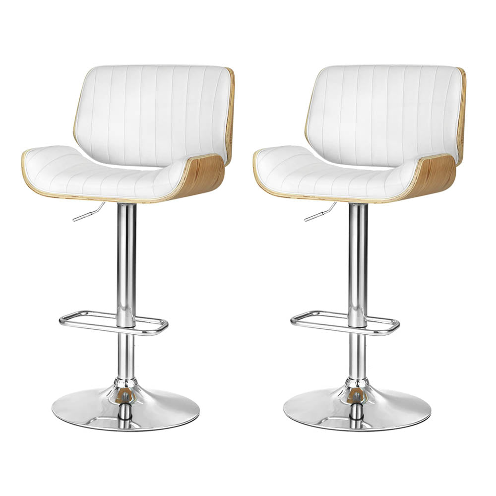 Mills Beach white gas lift bar stool with curved bentwood seat at a kitchen island