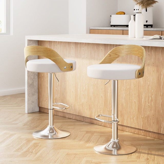 Bittern white faux leather bentwood swivel bar stool with gas lift in a kitchen