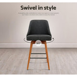 Four Artiss charcoal swivel bar stools in styled kitchen setting — Allure Home Collections
