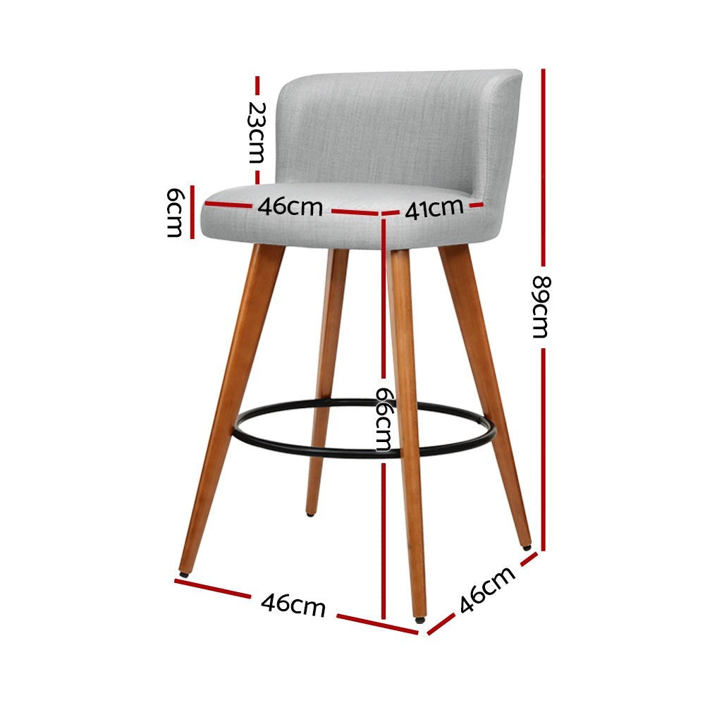 Parkdale grey faux linen bar stool with padded seat and wooden frame in a modern kitchen