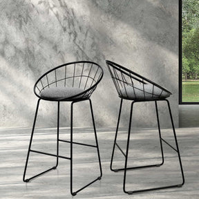 Officer black faux linen padded metal bar stools pair at a kitchen counter