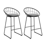 Patterson Lakes black faux linen bar stool with padded seat and steel frame at a kitchen counter