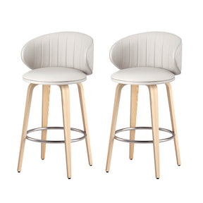 St Andrews Beach beige faux leather padded wooden bar stool in a modern kitchen