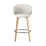 St Andrews Beach beige faux leather padded wooden bar stool in a modern kitchen