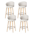 Flinders beige PU leather contoured bar stool 4pcs set with wooden legs in a kitchen