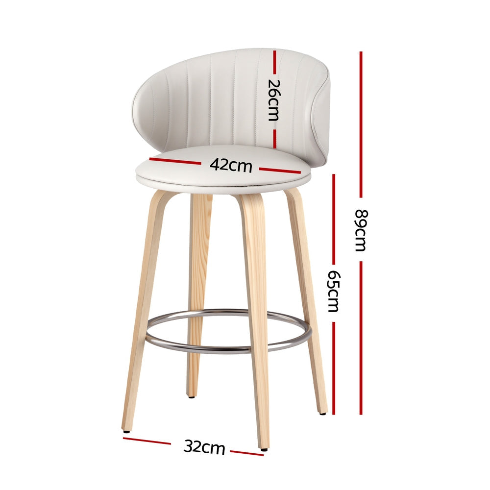 St Andrews Beach beige faux leather padded wooden bar stool in a modern kitchen