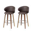 Flinders brown PU leather contoured bar stool 2pcs set with wooden legs in a kitchen
