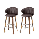 Flinders brown PU leather contoured bar stool 2pcs set with wooden legs in a kitchen