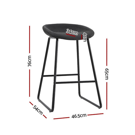 Sullivan Bay black faux leather padded metal bar stool at a kitchen counter