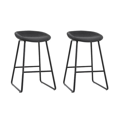 Sullivan Bay black faux leather padded metal bar stool at a kitchen counter