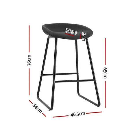 Sullivan Bay black faux leather padded metal bar stool at a kitchen counter