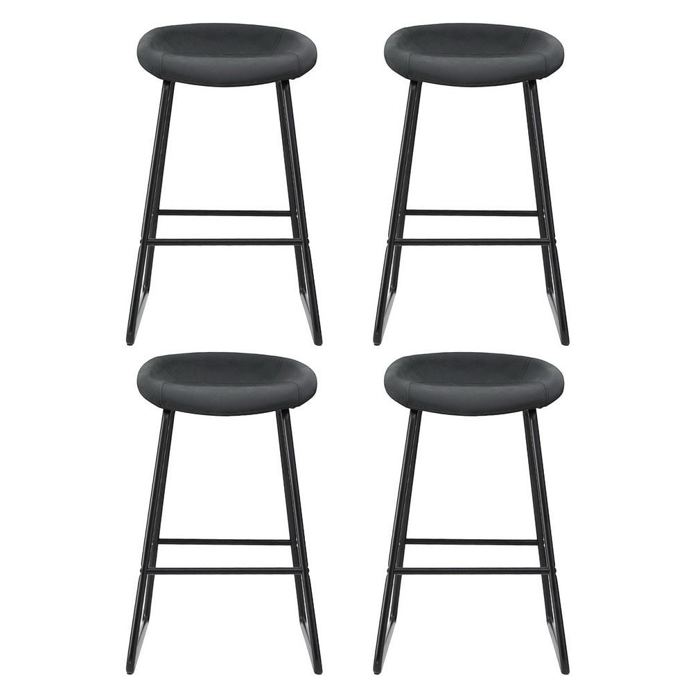 Sullivan Bay black faux leather padded metal bar stool at a kitchen counter