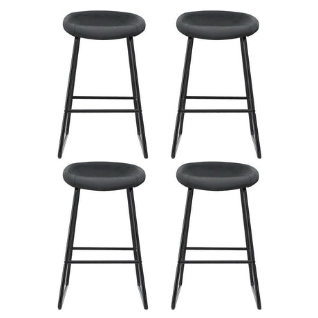 Sullivan Bay black faux leather padded metal bar stool at a kitchen counter