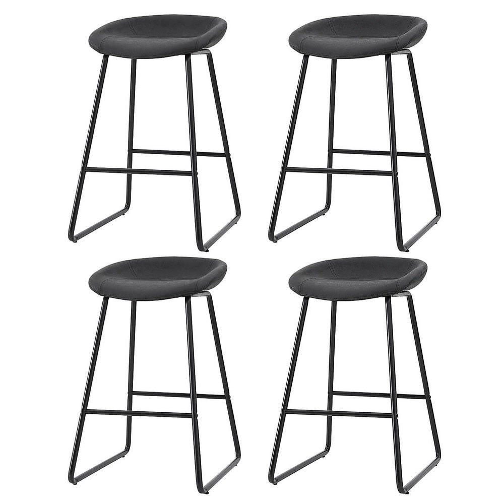 Sullivan Bay black faux leather padded metal bar stool at a kitchen counter