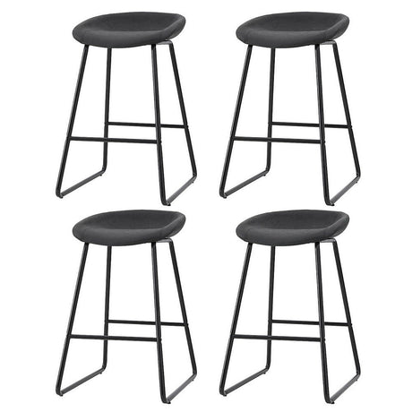 Sullivan Bay black faux leather padded metal bar stool at a kitchen counter