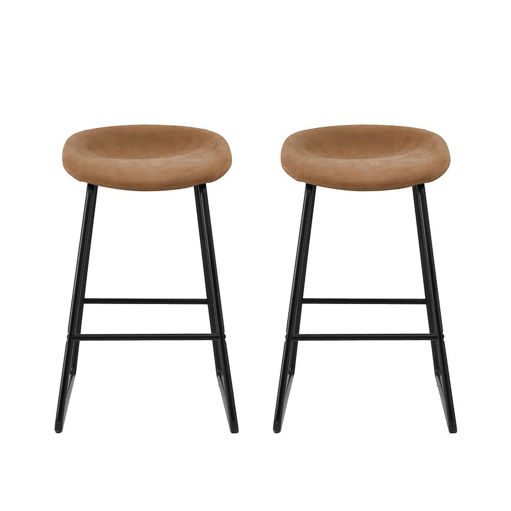 Sullivan Bay brown faux leather padded metal bar stool at a kitchen counter