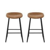 Sullivan Bay brown faux leather padded metal bar stool at a kitchen counter