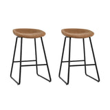 Sullivan Bay brown faux leather padded metal bar stool at a kitchen counter