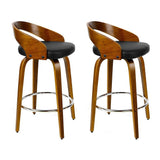 Point King swivel wooden bar stool with black faux leather seat and walnut frame