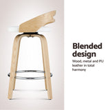 Four Artiss swivel bar stools in contemporary dining area — Allure Home Collections