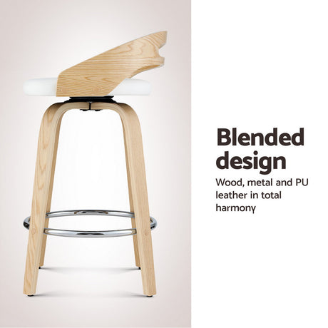 Four Artiss swivel bar stools in contemporary dining area — Allure Home Collections
