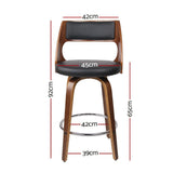 Highett black swivel faux leather bar stool with walnut legs in a modern kitchen