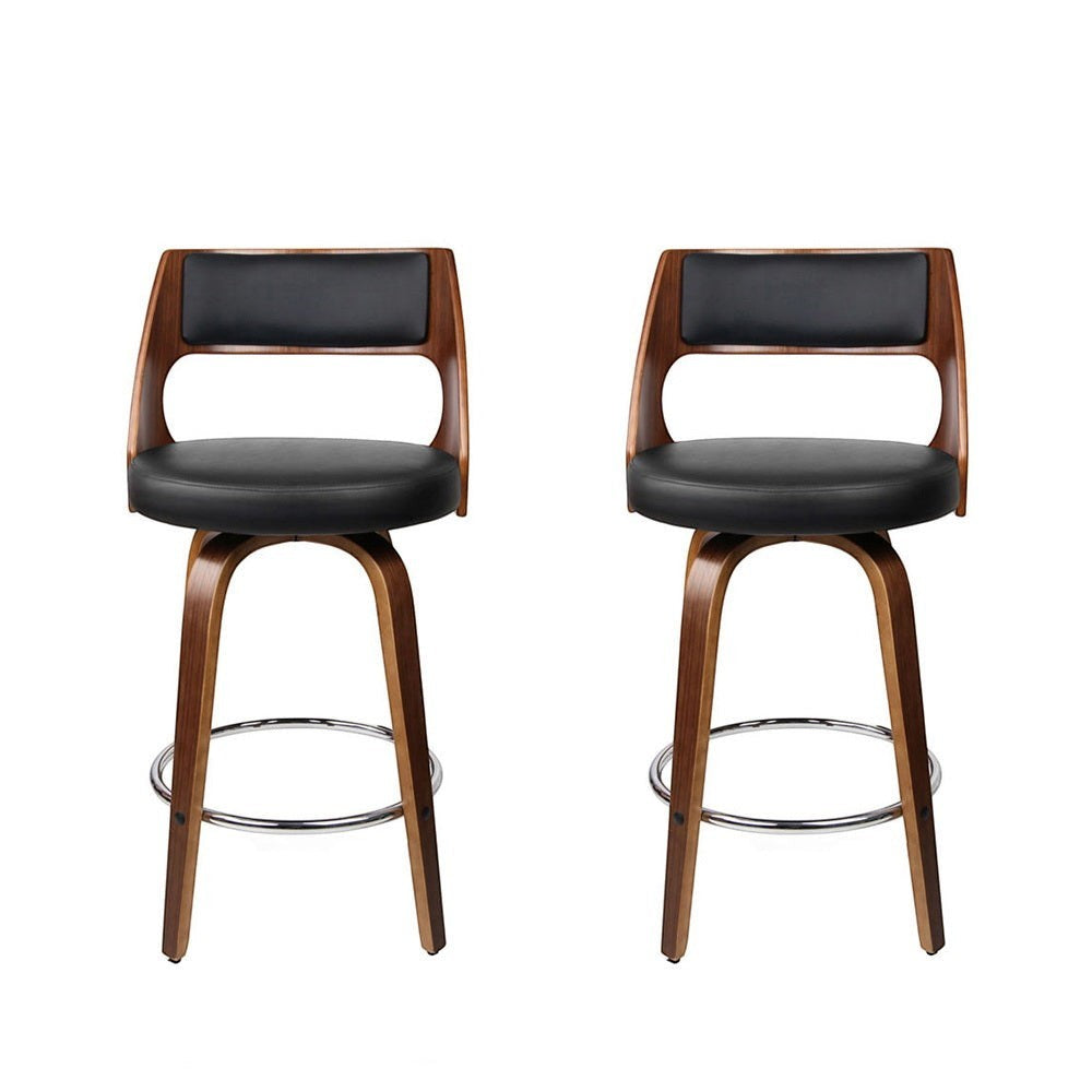 Highett black swivel faux leather bar stool with walnut legs in a modern kitchen