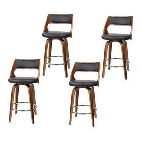 Highett black swivel faux leather bar stool with walnut legs in a modern kitchen
