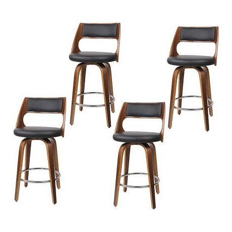 Highett black swivel faux leather bar stool with walnut legs in a modern kitchen
