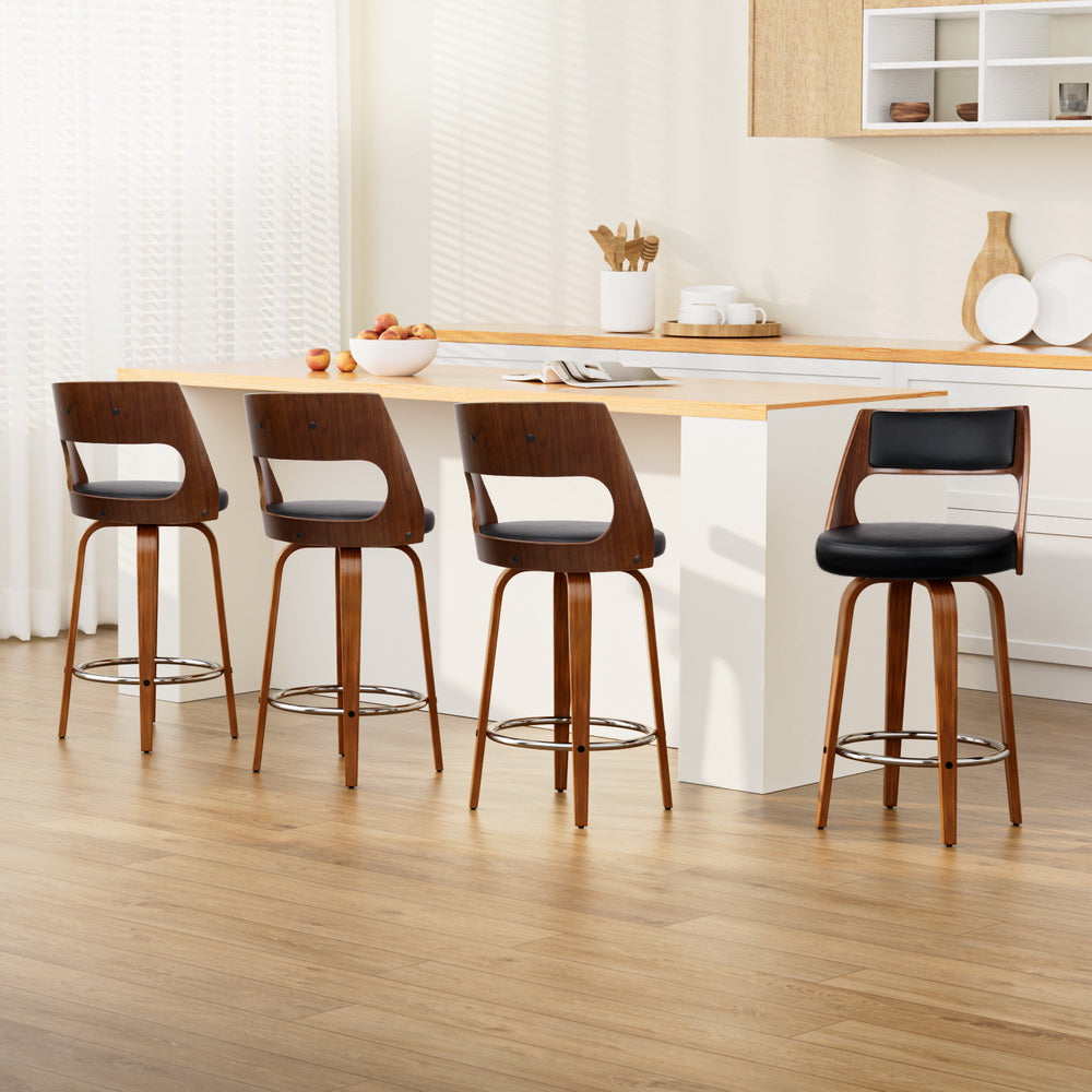 Four Artiss swivel leather bar stools in home, office, or cafe setting — Allure Home Collections