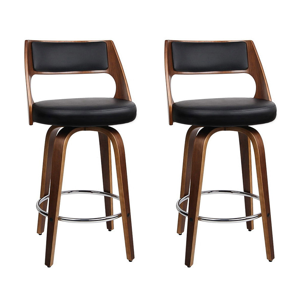 Highett black swivel faux leather bar stool with walnut legs in a modern kitchen