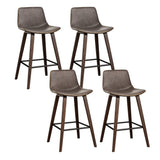 Devilbend walnut wooden bar stool with faux leather seat in a warm kitchen
