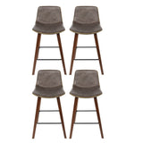 Devilbend walnut wooden bar stool with faux leather seat in a warm kitchen