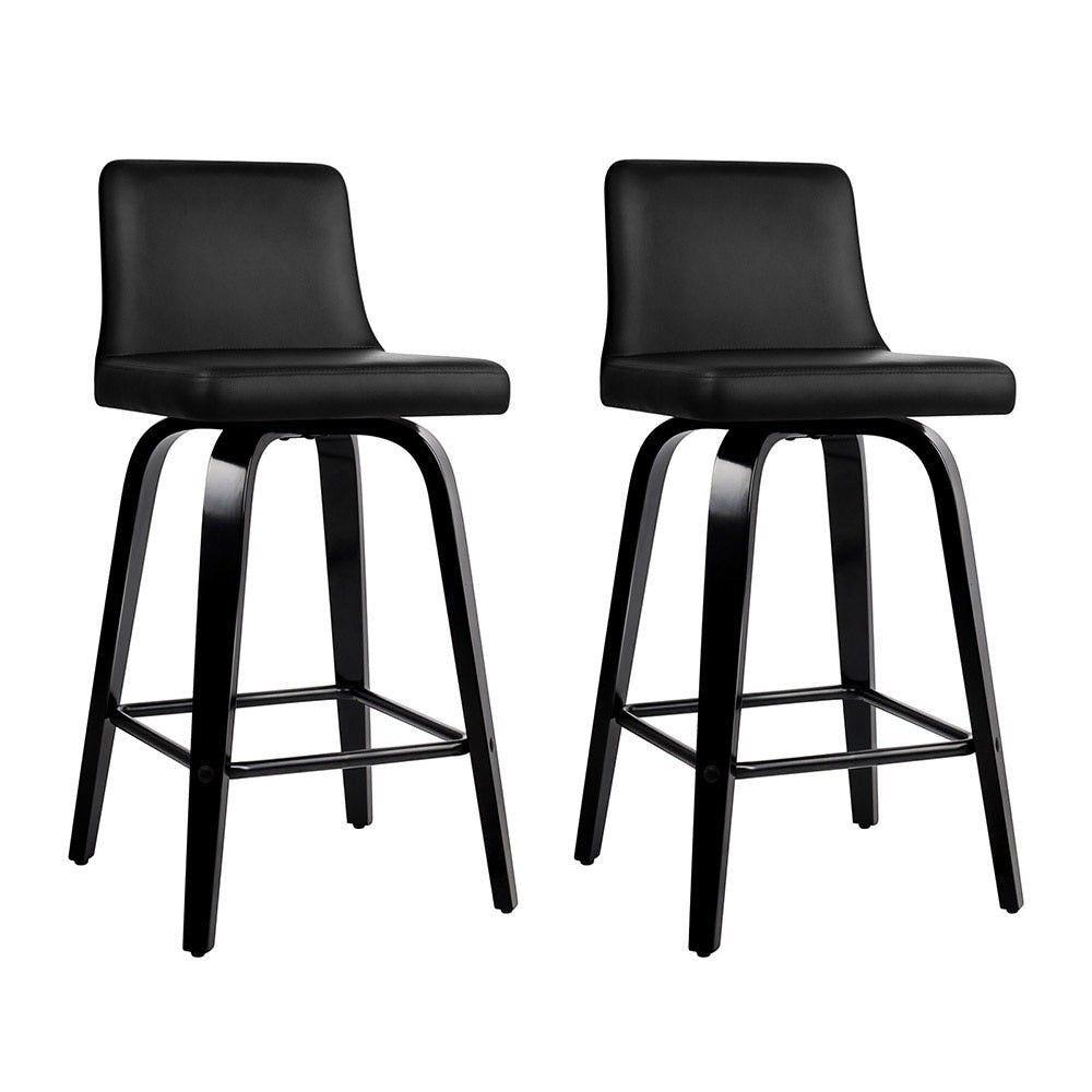 Balcombe black swivel wooden bar stool with padded seat in a modern kitchen