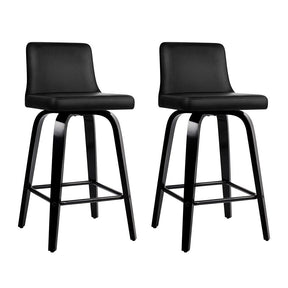 Balcombe black swivel wooden bar stool with padded seat in a modern kitchen