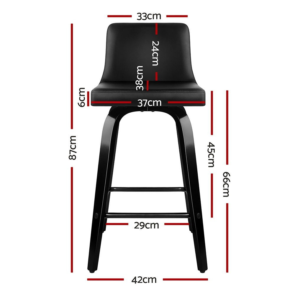 Balcombe black swivel wooden bar stool with padded seat in a modern kitchen