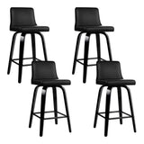 Balcombe black swivel wooden bar stool with padded seat in a modern kitchen