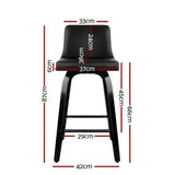 Balcombe black swivel wooden bar stool with padded seat in a modern kitchen