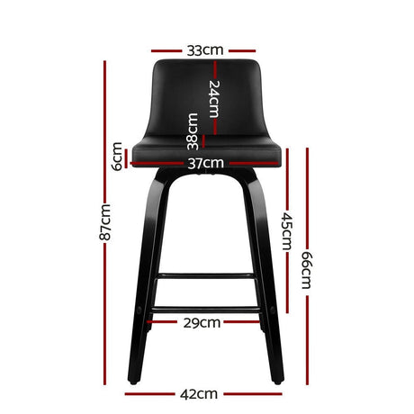 Balcombe black swivel wooden bar stool with padded seat in a modern kitchen