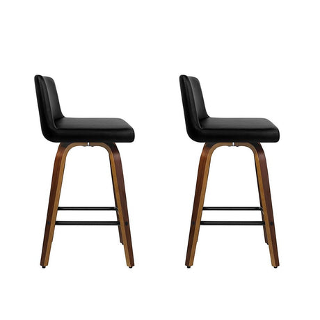 Balcombe walnut swivel wooden bar stool with padded seat in a modern kitchen