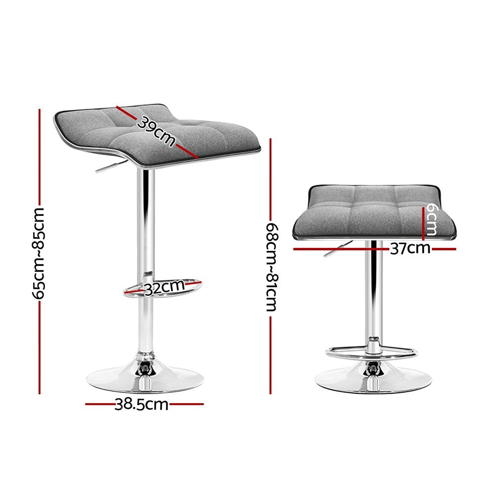 Coronet Bay grey faux linen gas lift swivel bar stool in a modern kitchen