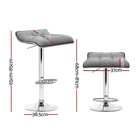 Coronet Bay grey faux linen gas lift swivel bar stool in a modern kitchen
