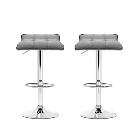 Two Artiss linen gas lift bar stools at kitchen counter — Allure Home Collections