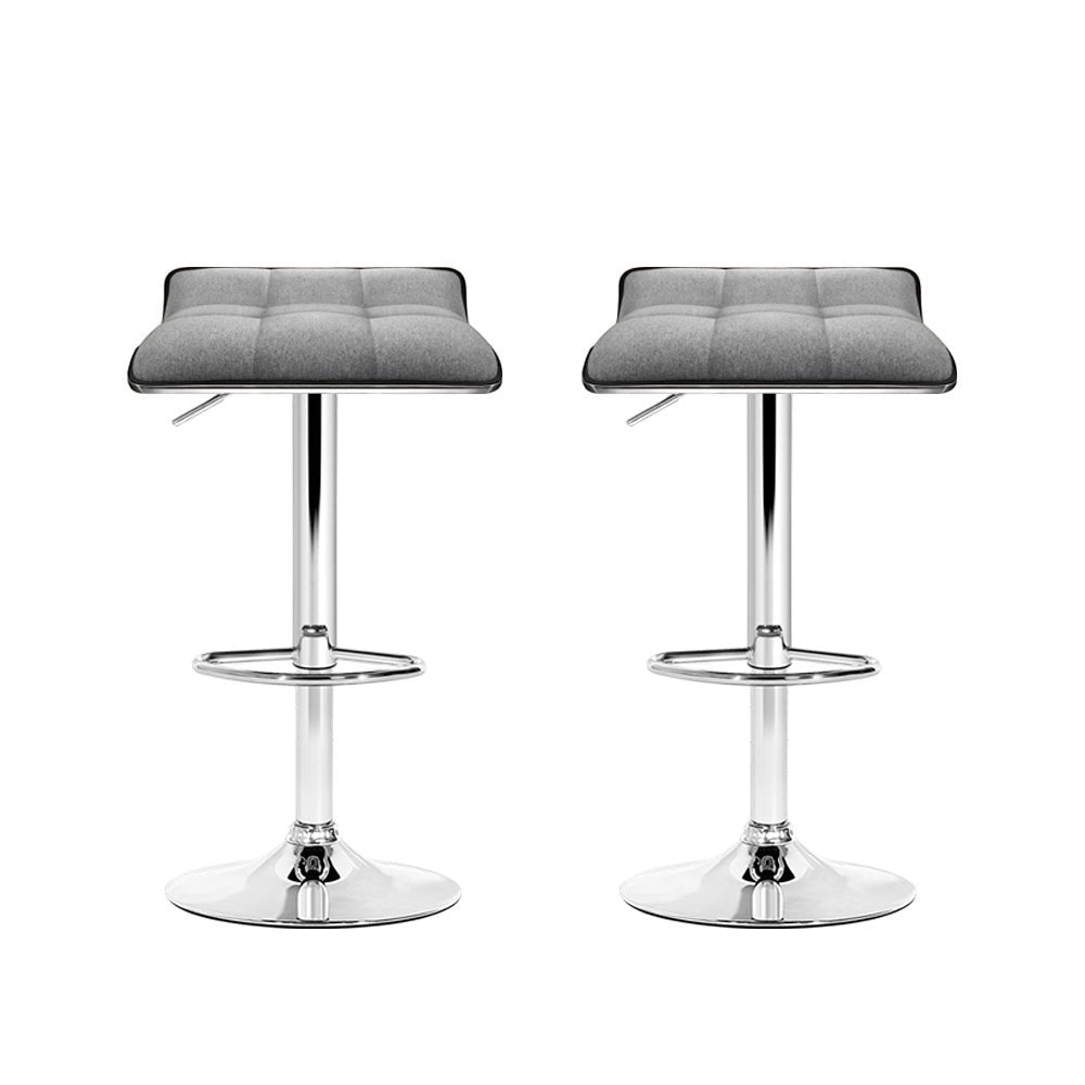 Coronet Bay grey faux linen gas lift swivel bar stool in a modern kitchen