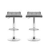 Coronet Bay grey faux linen gas lift swivel bar stool in a modern kitchen