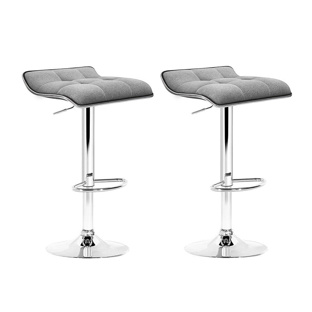 Coronet Bay grey faux linen gas lift swivel bar stool in a modern kitchen