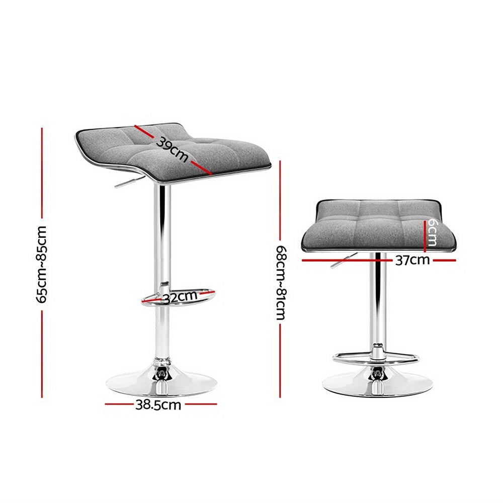 Coronet Bay grey faux linen gas lift swivel bar stool in a modern kitchen