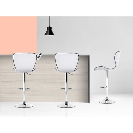 Set of 4 Artiss white leather gas lift bar stools at kitchen island — Allure Home Collections